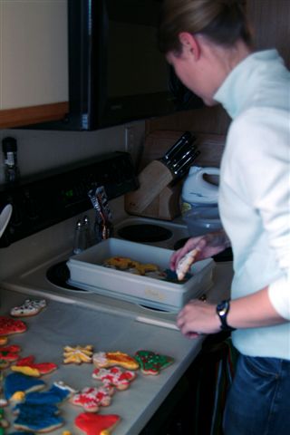 jess putting away cookies